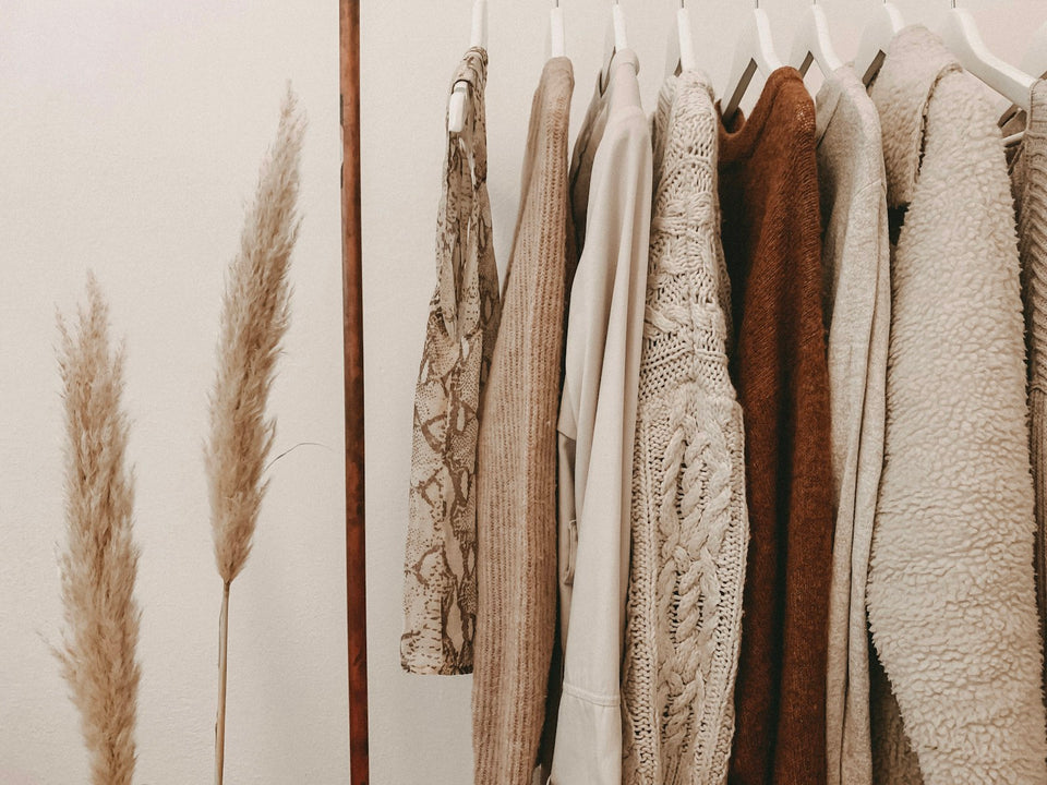 Clothing designer preparing garments for a brand launch